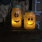 Jar Lanterns with jack-o'-lantern faces