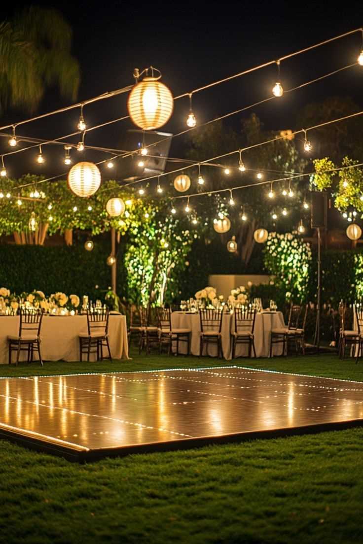 Dance Floor Under Hanging Globe Bulbs as one of the Backyard Night Wedding Ideas