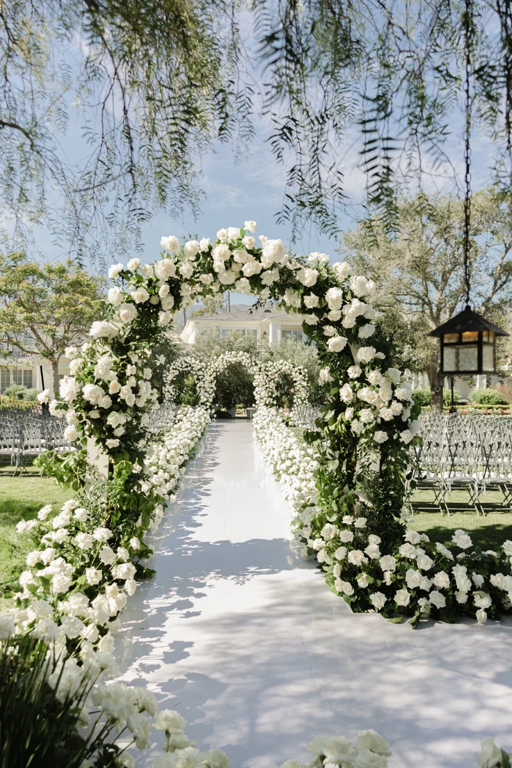 Garden-Pathway-Entrance-with-Floral-Framing-summer wedding entrance ideas