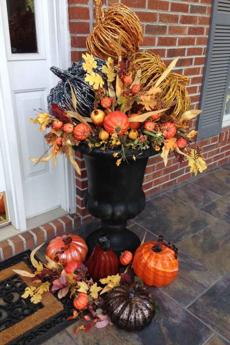 Black Urns Filled With Seasonal Foliage for Halloween porch decor ideas
